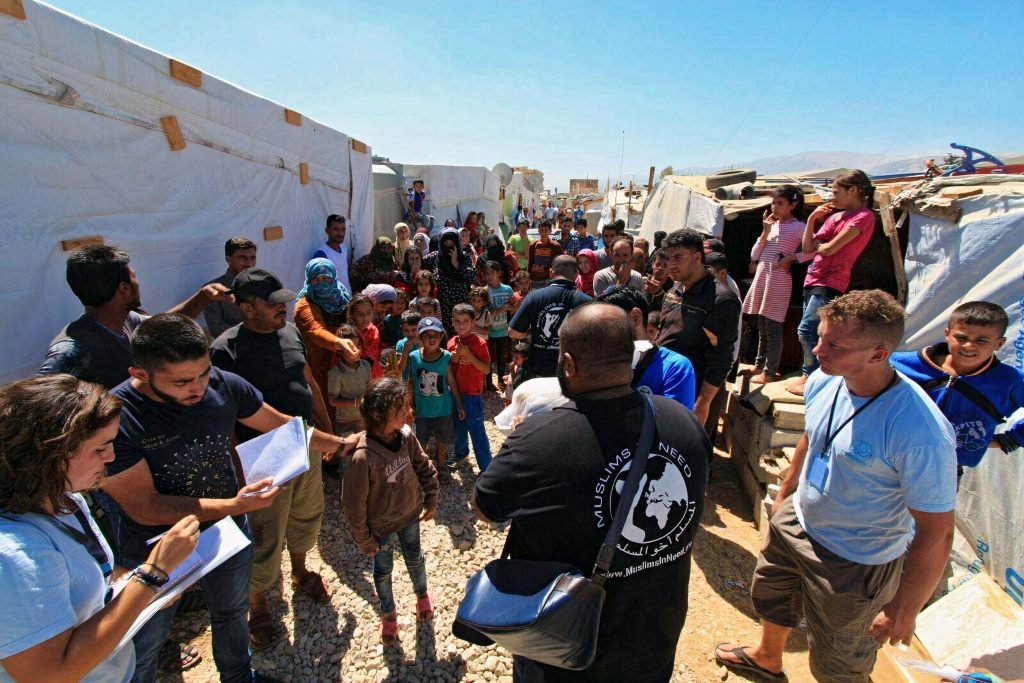 Muslims In Need team distributing aid to families